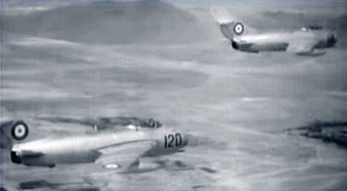 Two Afghan MiG-17F  Fresco-C  from the 366th Fighter Air Regiment over Kandahar province in early eighties.