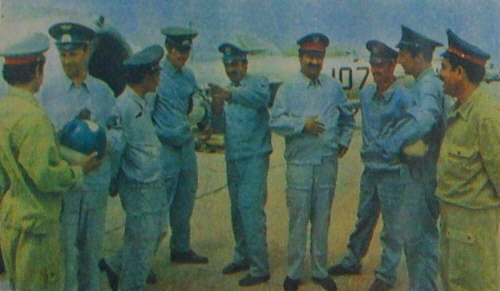 Soviet and afghan pilots in front of Afghan Air Force s silver coloured MiG-17 Fresco fighter-bombers.