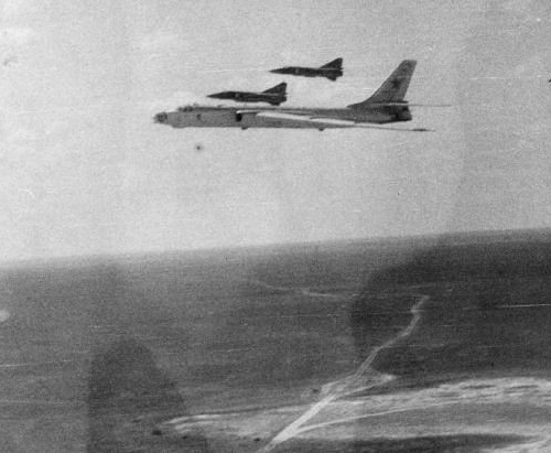 The 678th Guards Mixed Test Air Regiment's Tu-16 'Badger' and MiG-23 'Flogger' aircraft over the Kazakh desert.