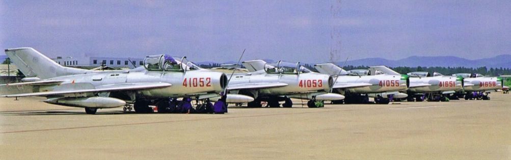 Two Chinese Shenyang JJ-6 advanced trainer and three J-6A MiG-19P Farmer-B all-weather interceptors of 44th Air Division