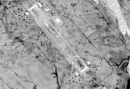 After the completion of the Al-Bombah (Martyr Ali Al-Rais) air base, it had a 3.5 km (11 600 ft) runway and 32 reinforced hardened shelter. Each shelter could store two MiG-21 or MiG-23 aircraft. Thus, the base could provide protection for 64 such aircraft! Image: Maxtar