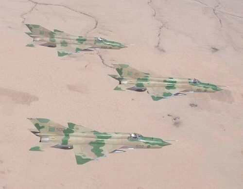 Three Libyan MiG-21 over the desert in 2007