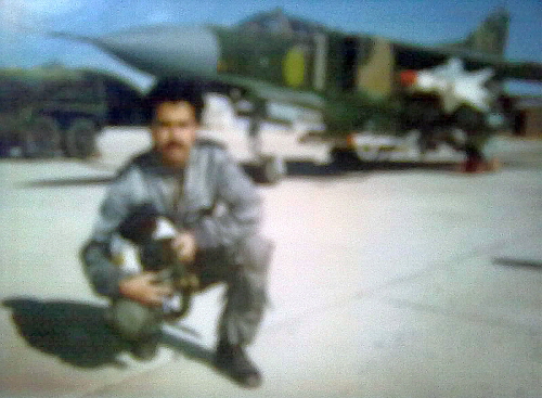 A pilot of the Libyan 1090th Air Squadron and his MiG-23MF ‘Flogger-B’ fighter jet at the Ghardabiya air base in the 1980s. The MiG-23MF has an unusual dark camouflage pattern for the desert, similar to that of the Czechoslovak MiG-23MFs. It was armed with R-3S ‘Atoll’ and R-23R ‘Apex’ missiles. A pilot of the Libyan 1090th Air Squadron and his MiG-23MF ‘Flogger-B’ fighter jet at the Ghardabiya air base in the 1980s. The MiG-23MF has an unusual dark camouflage pattern for the desert, similar to that of the Czechoslovak MiG-23MFs. It was armed with R-3S ‘Atoll’ and R-23R ‘Apex’ missiles.