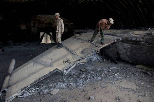 Libyan MiG-25PD Foxbat-E under hardened shelter at Ghardabiya airbase after B-2 attack 03