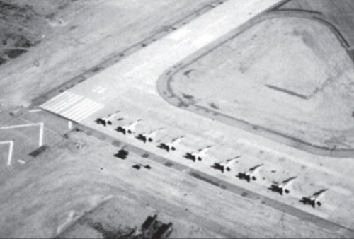 Libyan 1055th Squadron s MiG-25PD  Foxbat-E  interceptor row at the end of the runway at Ghardabiya (Sirte) Air Base