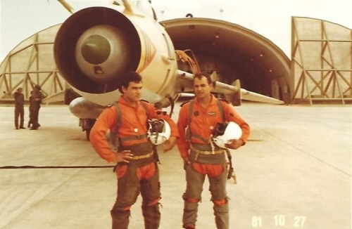 The 1022nd Squadron's two pilot with their Su-22M (S-52K) reconnaissance bomber aircraft in front of aircraft shelters at Ghardabiya (Sirte) Air Base in 1981.
