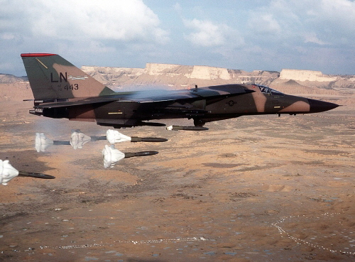 The 48th Tactical Fighter Wing F-111F aircraft releasing its load of Mark 82 high-drag bombs over the Bardenas Reales range in Spain for training. Source: Wikipedia