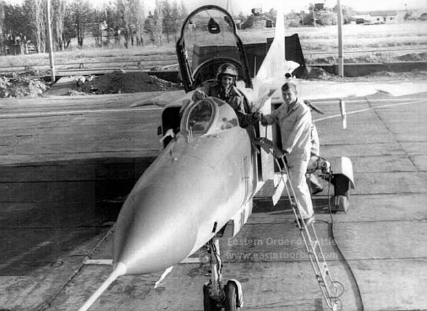 Soviet 715th Training Air regiment's crew and theirs MiG-23MS Flogger-E export fighter aircraft in the seventies at Lugovaya airfiled . (B/N: red 12 and red 11)